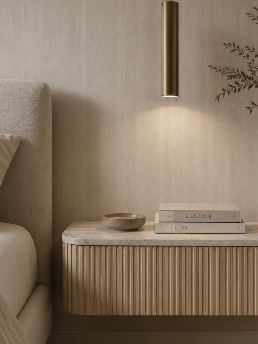 Bedroom with a Yunshan beige grey travertine-look BétonFlex flexible wall panel and a natural oak slat nightstand