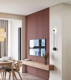 Linéapur Drum PVC wall panels painted dusty rose as a living room accent wall