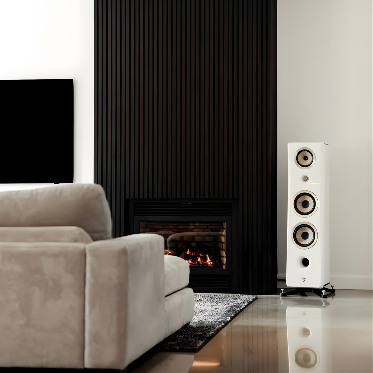 Residential living room with fireplace framed by black ash acoustic panels on black felt | Artmur
